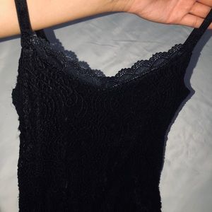 Xs, Little black lace dress.